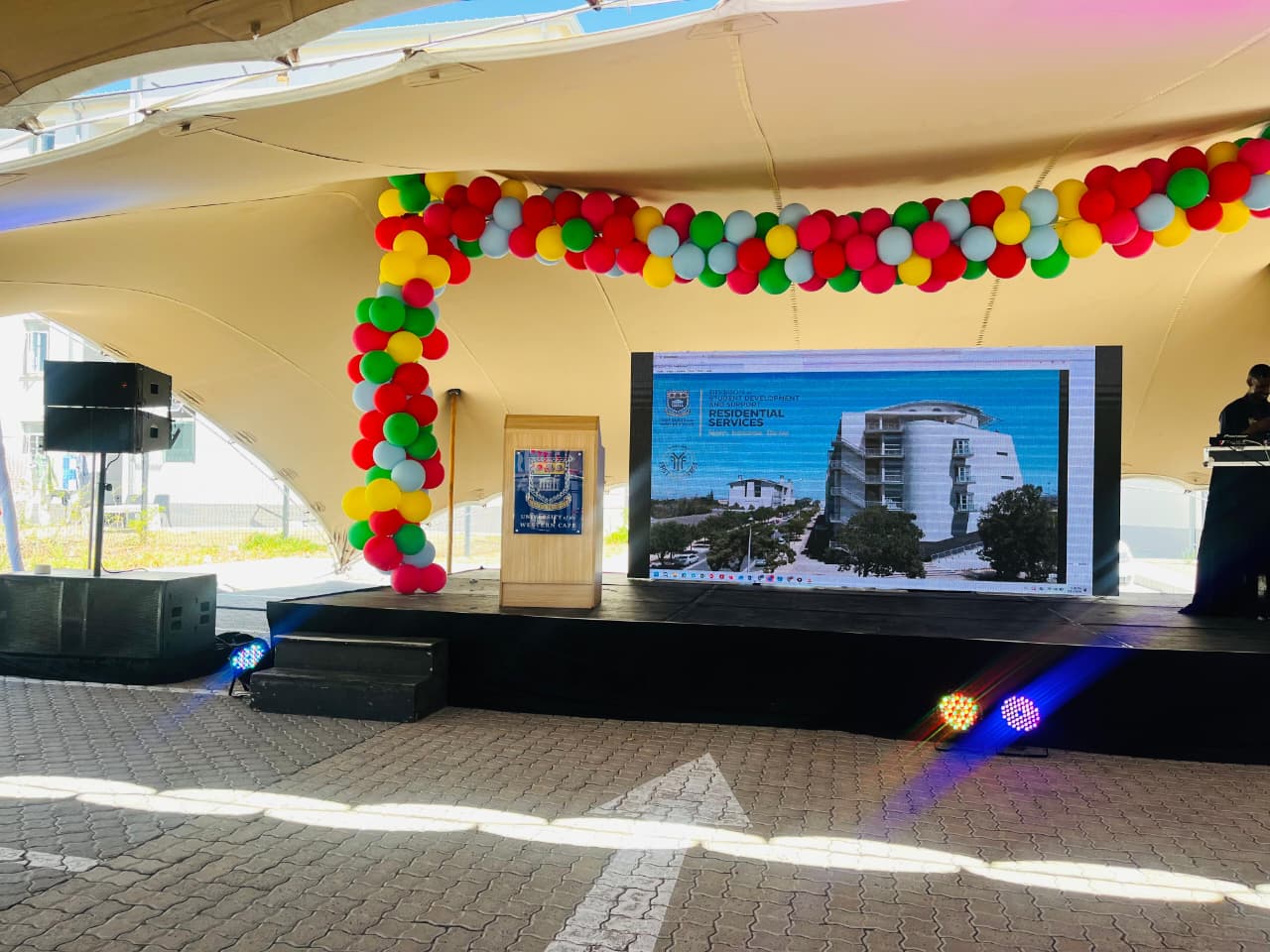 Corporate conference with delegates and a presentation stage